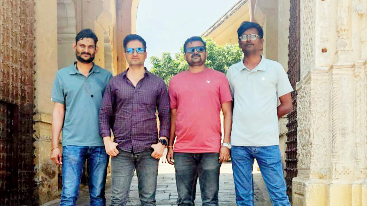 (From left) Head Constable Santosh Khedekar, PSI Sachin Borse, and Police Constables Avinash Suttar and Pradeep Rathod