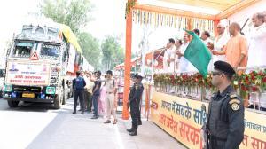 UP CM flags off 48 trucks with flood relief for Uttarakhand, Himachal and Punjab