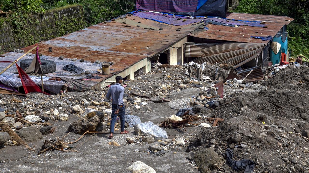 The shops and hotels on Sahastradhara Road were severely damaged due to floods triggered by heavy rains. Debris came into the main market and caused damage to hotels and shops