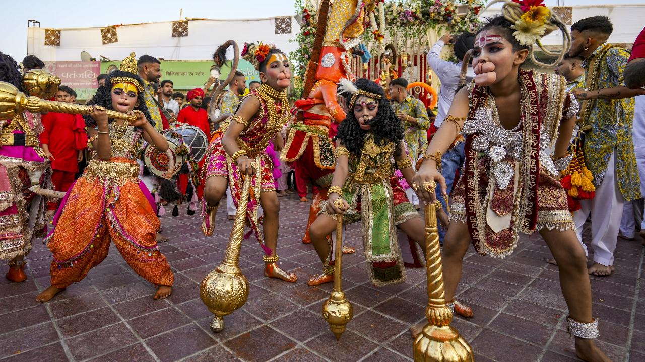 Young devotees dressed as Lord Hanuman take part in the 'Langur Mela' celebration. Photo Courtesy: PTI