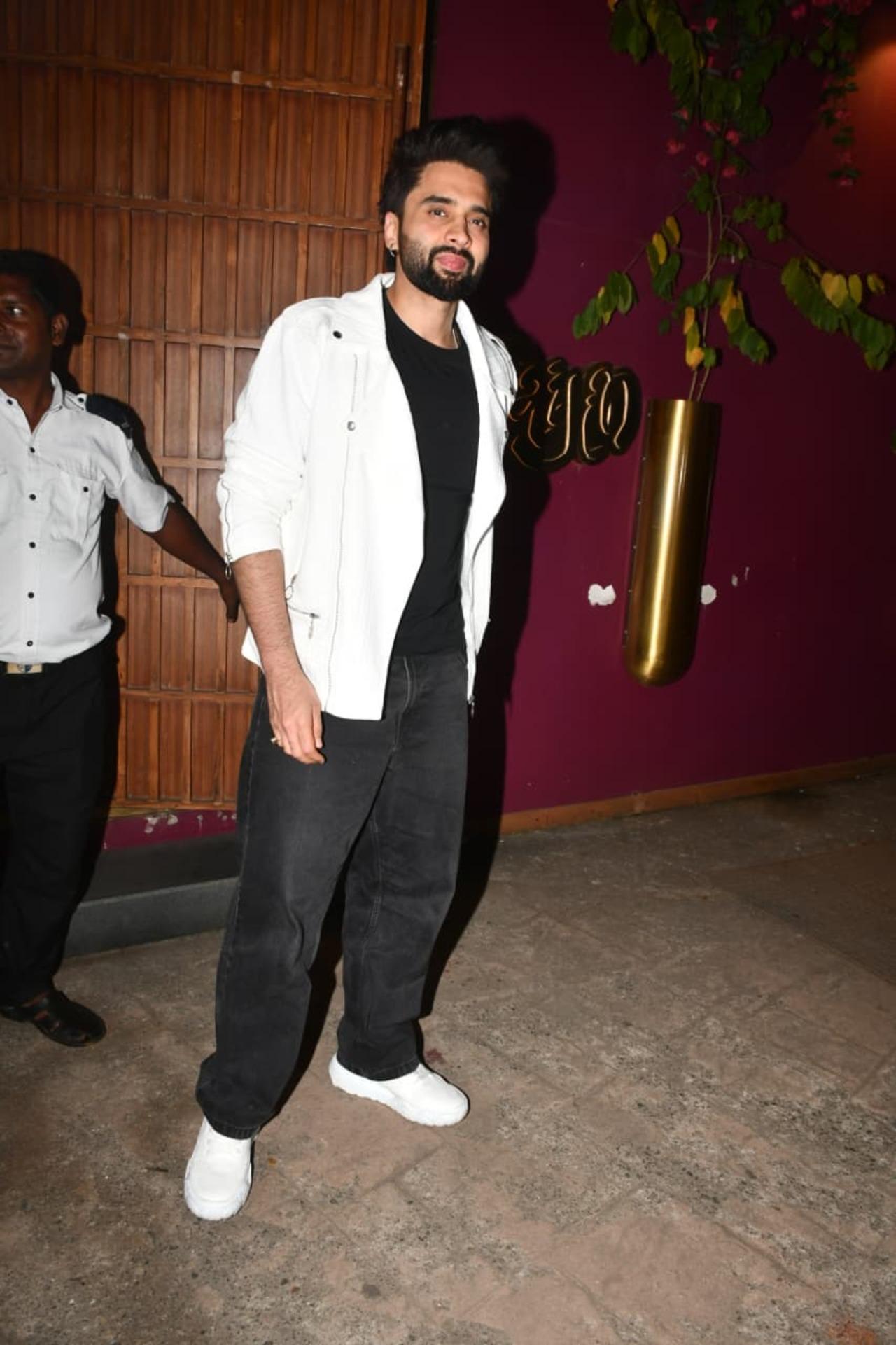 Date night? Jacky goes for the smart casuals to complement Rakul's stunning dress