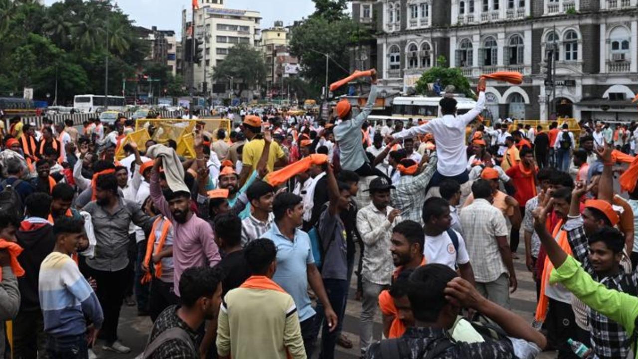 <p>The Maratha quota supporters hung on to the activist`s every word as he read the draft of the cabinet sub-committee and erupted in joyful cries</p> <p>The Maratha quota supporters hung on to the activist`s every word as he read the draft of the cabinet sub-committee and erupted in joyful cries</p>