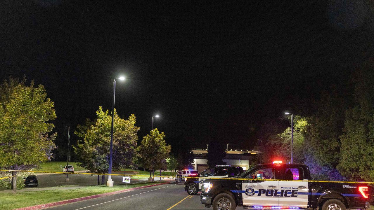 Police vehicles are seen outside Utah Valley University, placed on lockdown after youth activist and influencer Charlie Kirk was shot during a public event, in Orem, Utah