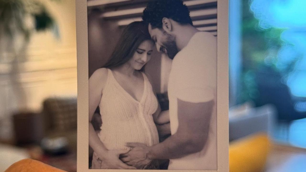 Certainly one of the cutest and adorable picture of the couple is this picture which they posted to announce their pregnancy. The two are seen embracing the baby bump an dlooking at it with love and excitement.