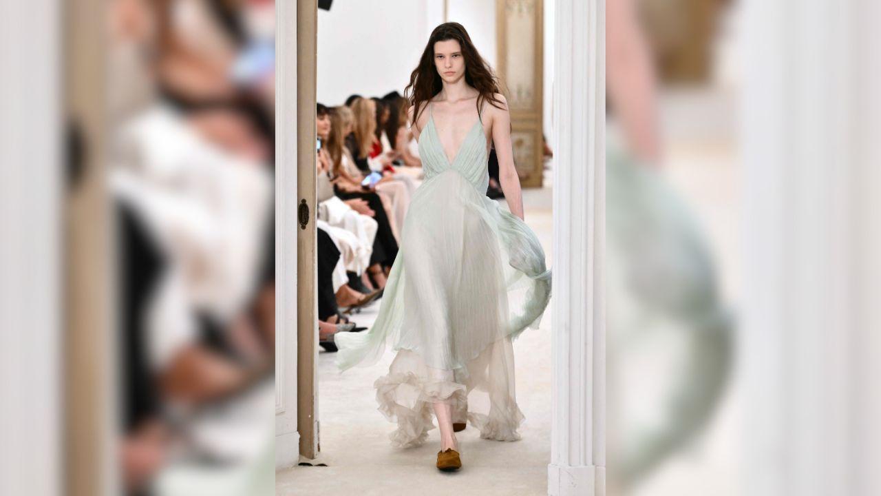 A model walking on the runway during the Alberta Ferretti collection show. Photo Courtesy: AFP