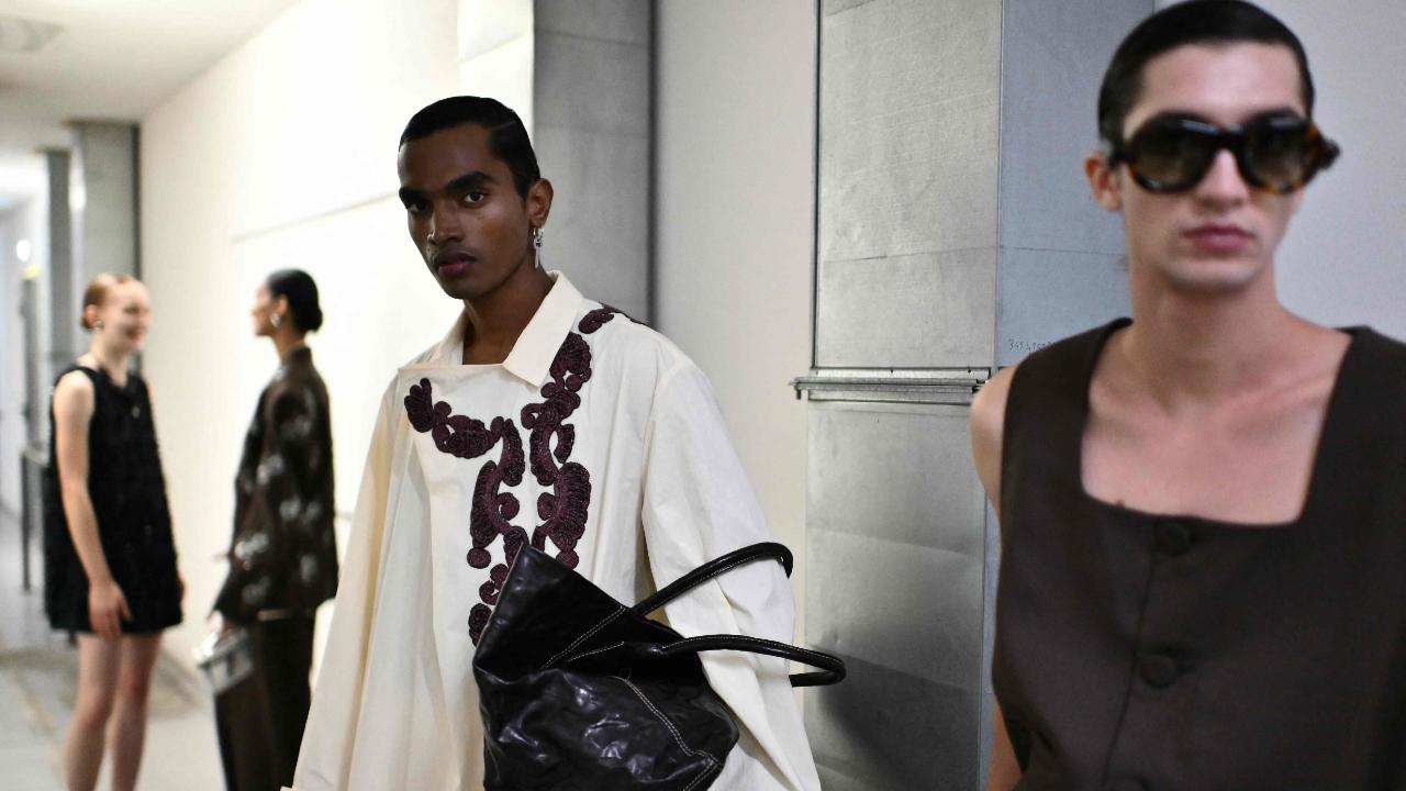 Male Models posing backstage before the Dhruv Kapoor collection show. Photo Courtesy: AFP