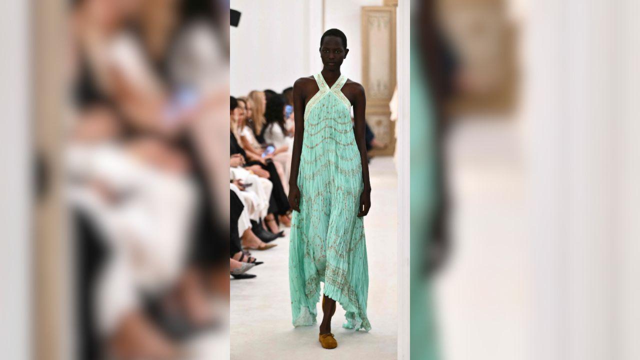 A Model walking down the runway during show at Milan's Fashion Week Womenswear Spring / Summer 2026. Photo Courtesy: AFP