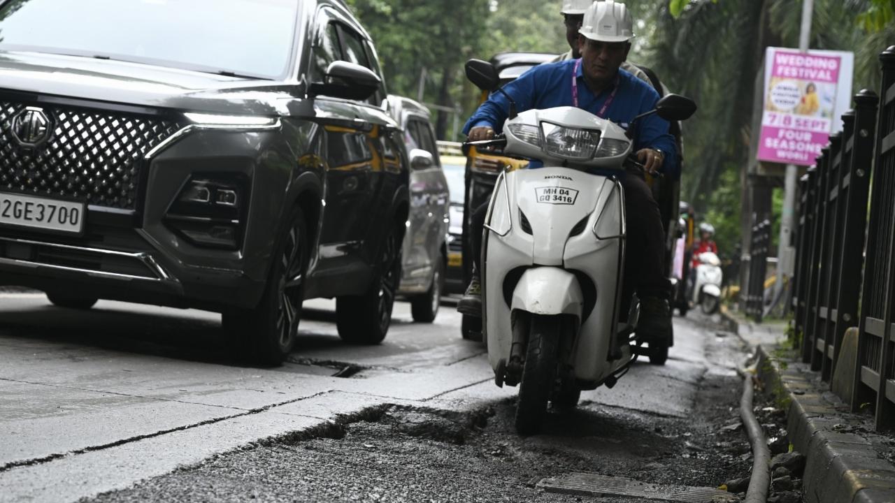 Motorists were seen being forced to slow down or swerve dangerously to avoid damage to their vehicles