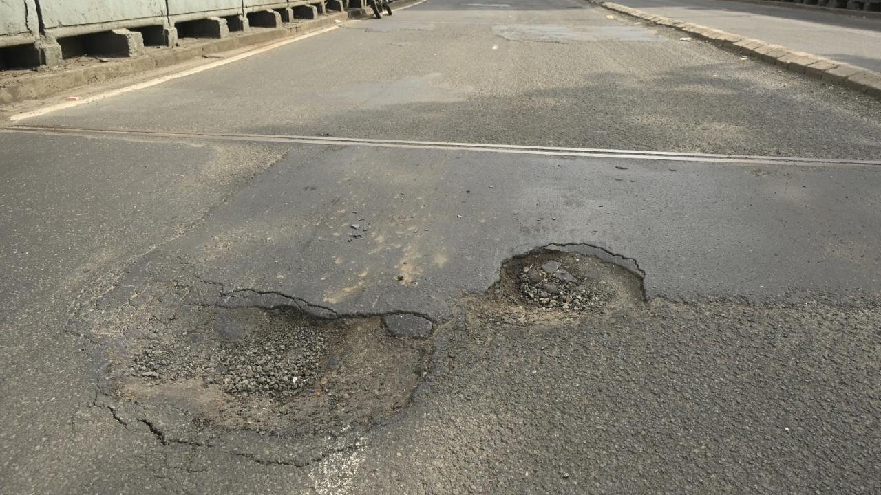 Large potholes on busy roads increase the risk of accidents