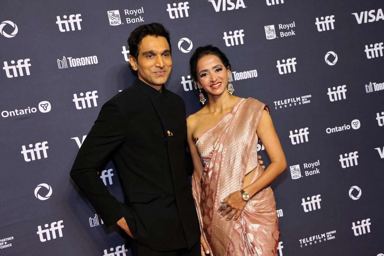 Pratik Gandhi and Bhamini Oza arrive in style at the red carpet for their film Gandhi