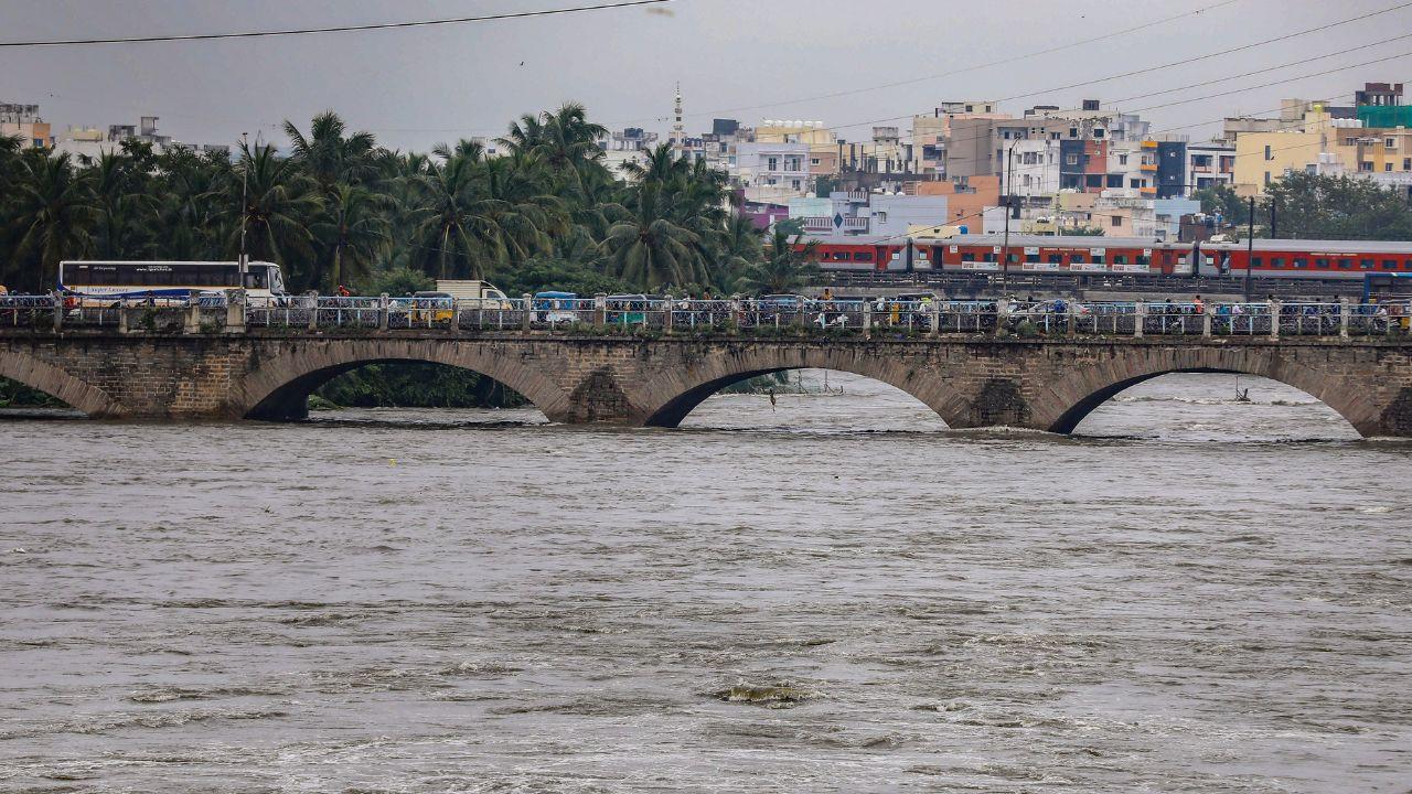 Swollen Musi river after heavy rains, in Hyderabad. (Pics/PTI)