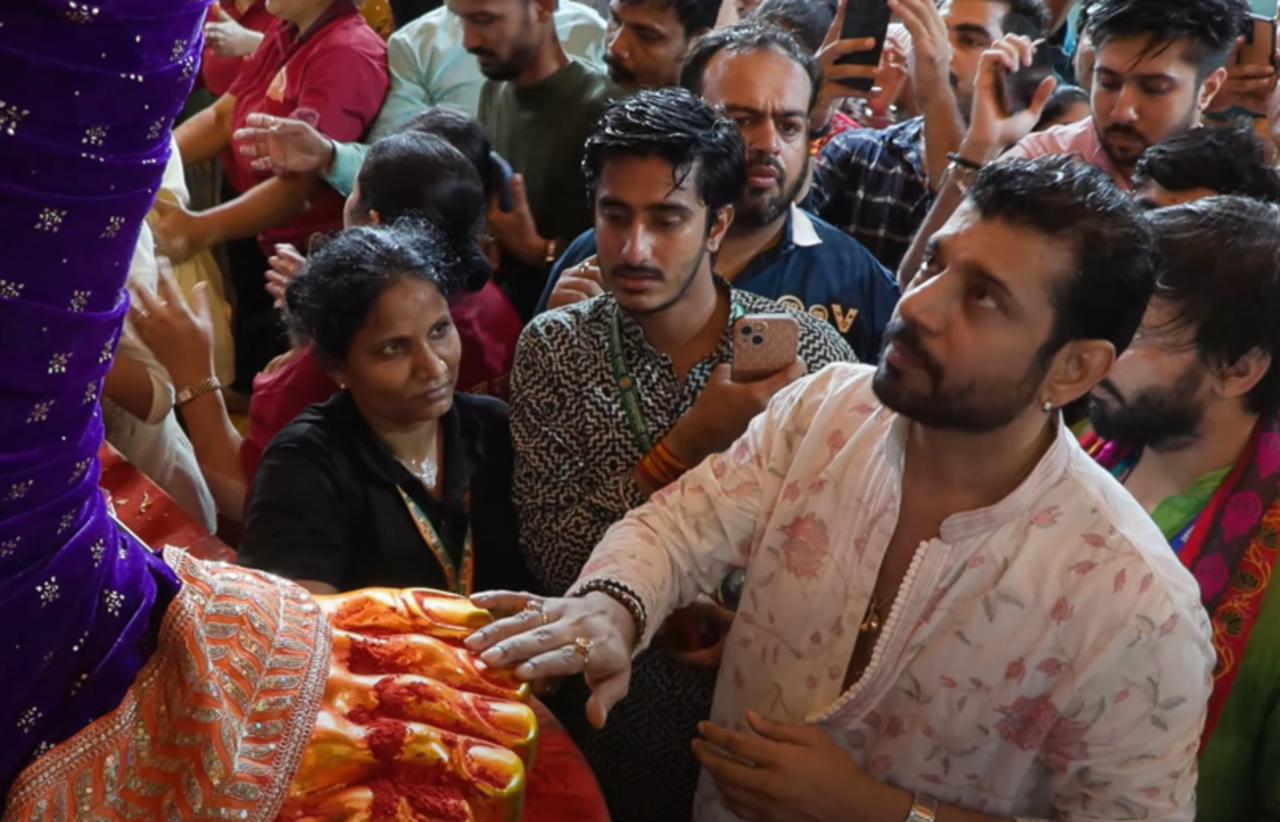 Chhaava star Vineet Kumar was also spotted at the Lalbaugcha Raja pandal dressed in a white kurta, navigating his way through the crowds.