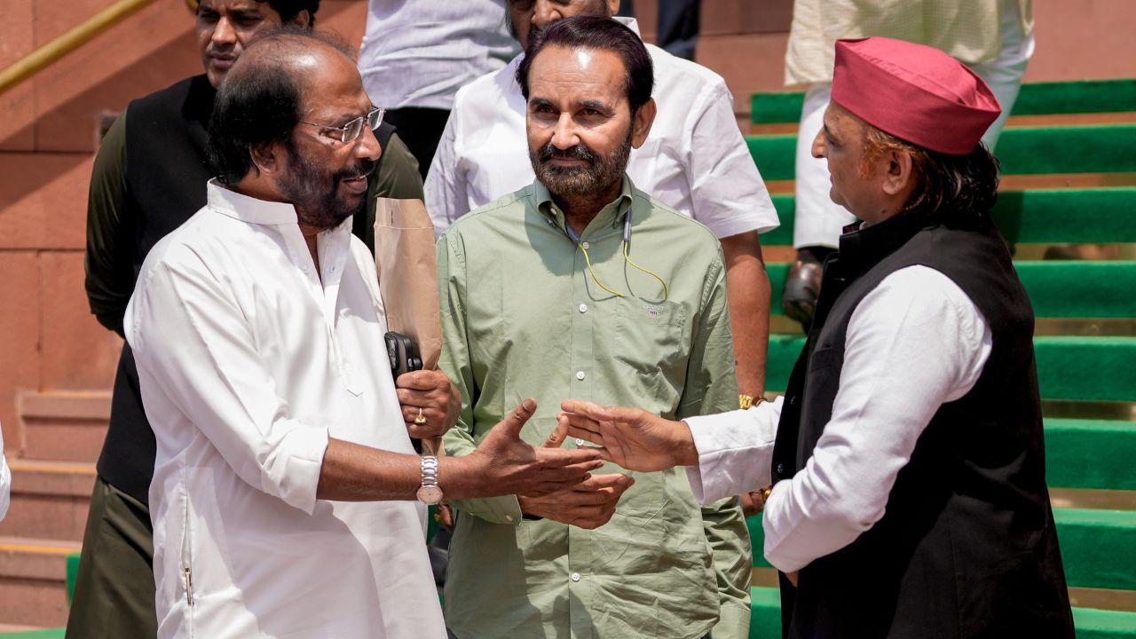 DMK MP Tiruchi Siva, front left, interacts with Congress MP Shaktisinh Gohil, front centre, and Samajwadi Party (SP) MP Akhilesh Yadav, right, were also present during the Special session of Parliament