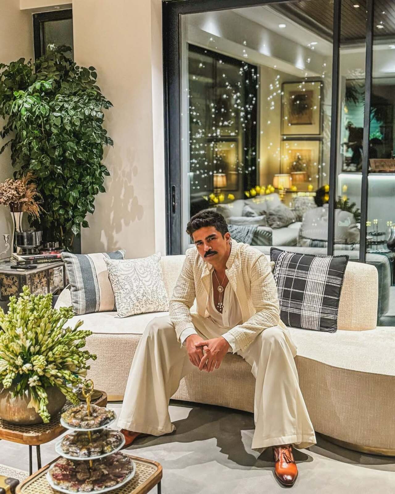 Saqib Saleem shows how to bring understated elegance in a white kurta topped with a matching, textured layer and paired with palazzo pants.