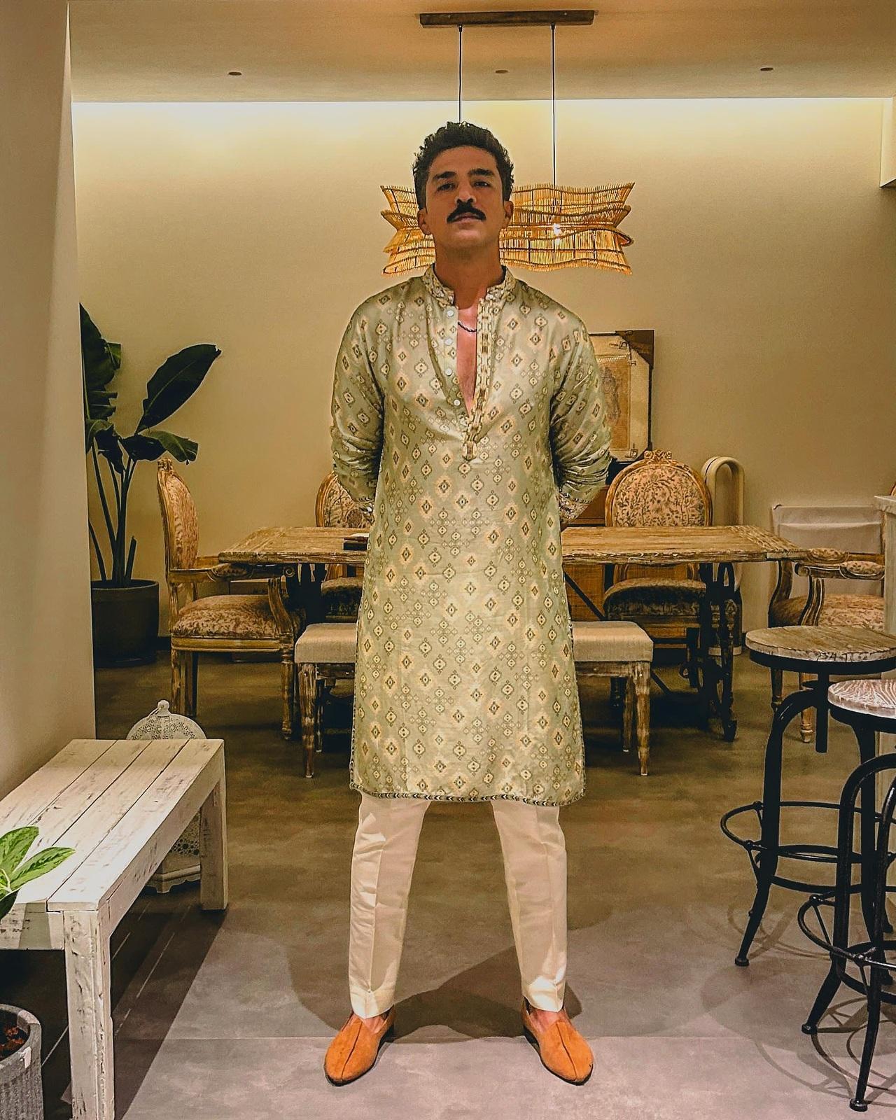 Saqib Saleem keeps it effortlessly stylish in a light green kurta featuring subtle intricate detailing, paired with crisp white pants.