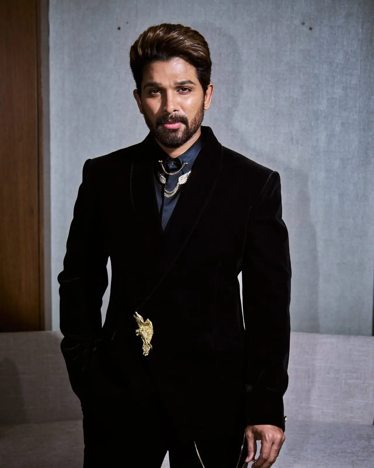 At the 2025 SIIMA Awards in Dubai, Allu Arjun wore a custom black velvet tuxedo from Gaurav Gupta Man, featuring signature, intricate brooch detailing.
