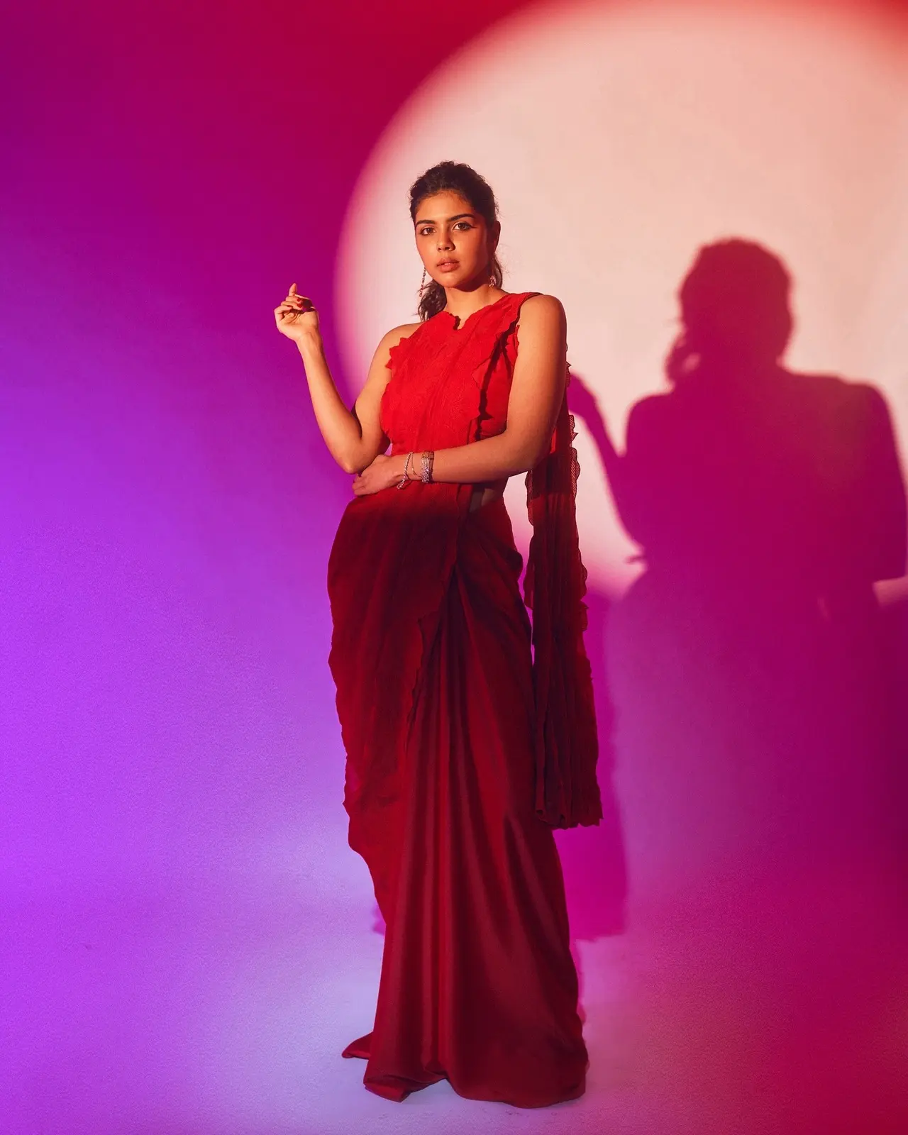 Kalyani Priyadarshan stuns in this all-red ensemble, draped in a fluid, sculptural silhouette that feels both modern and timeless.