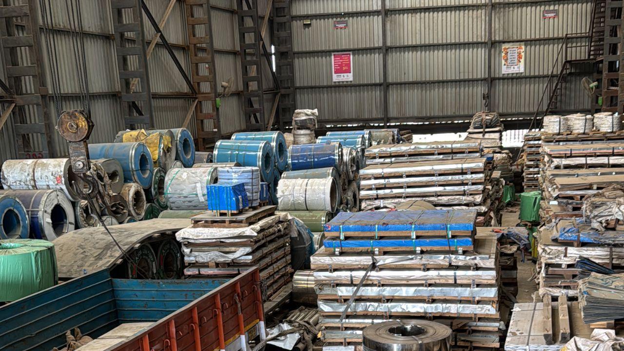 Raw materials such as coils and stainless steel sheets pile up in a Palghar godown as a Mumbai-based steel manufacturer claimed that business was experencing a sharp cut down in production