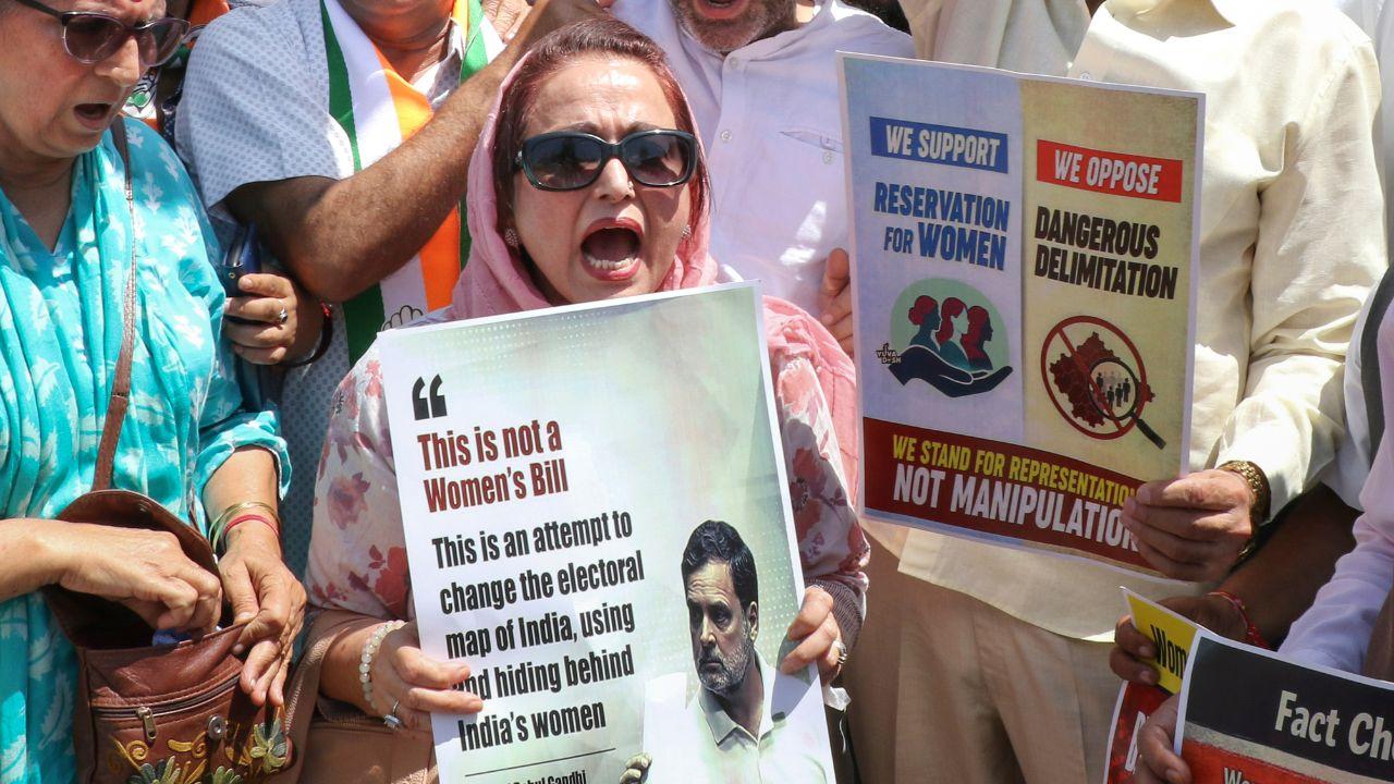 Meanwhile, workers of the Indian National Congress stage a counter-protest outside their office, criticising the BJP&rsquo;s stance on the bill&nbsp; calling it a "blatant and desperate assault on democracy under the guise of women's empowerment"