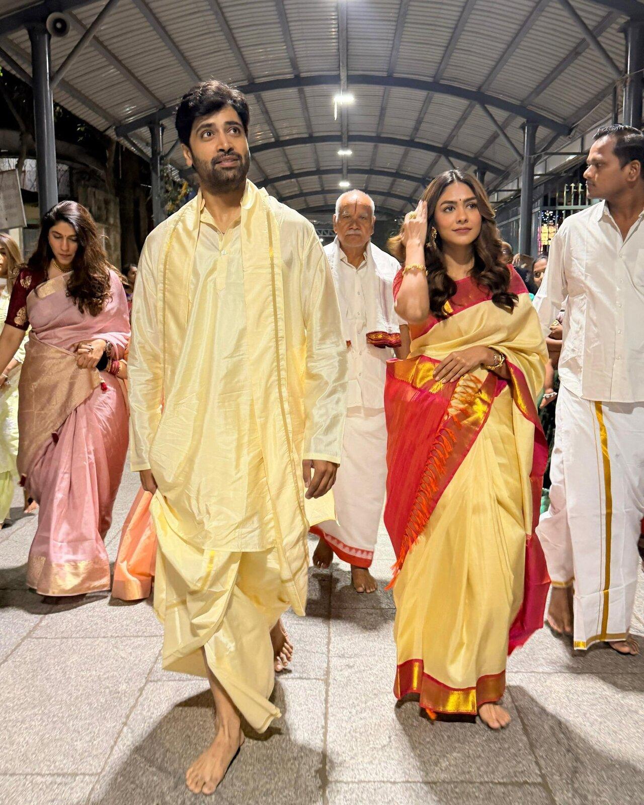 Mrunal Thakur exuded grace during her visit to Tirupati Temple, draped in a white silk saree with a pink and gold border. The elegant ensemble, paired with minimal styling, highlighted her timeless beauty and traditional charm.