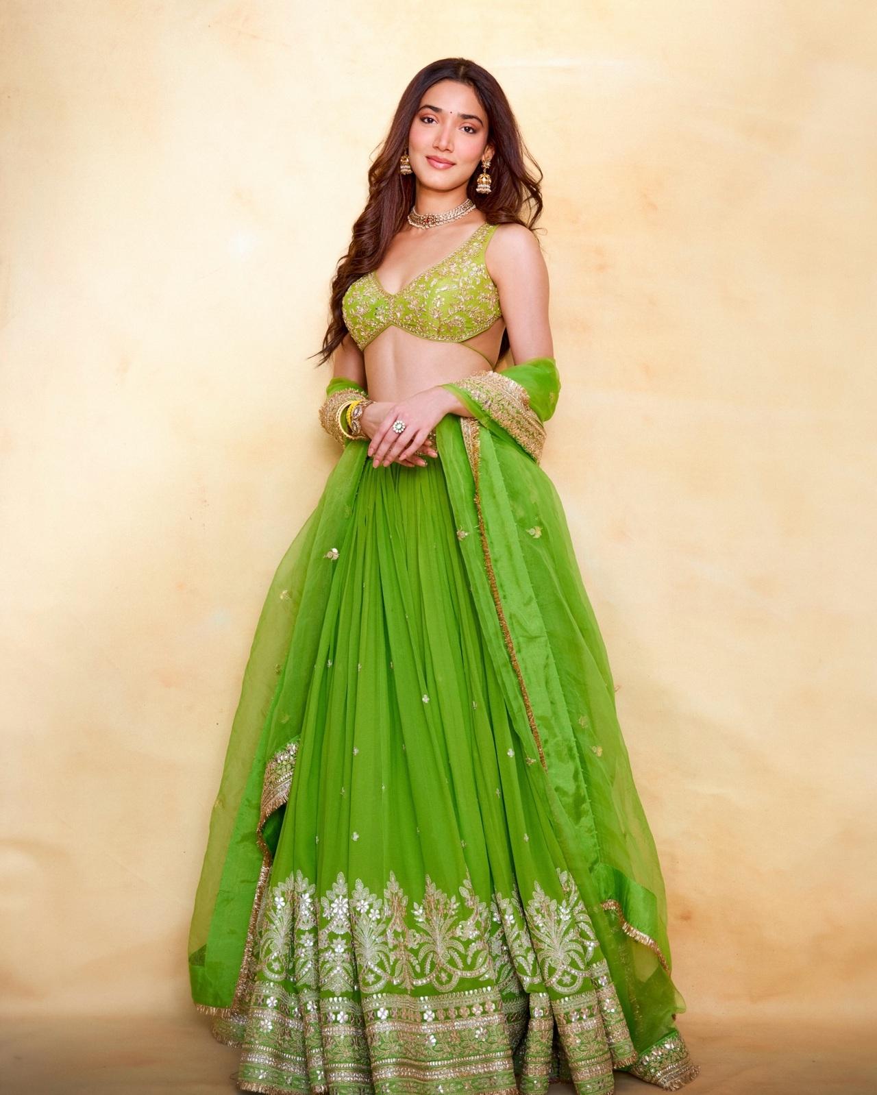 Medha Shankr looks vibrant and radiant in this lime-green lehenga with embellished plunge-neck blouse with intricate gold floral embroidery.