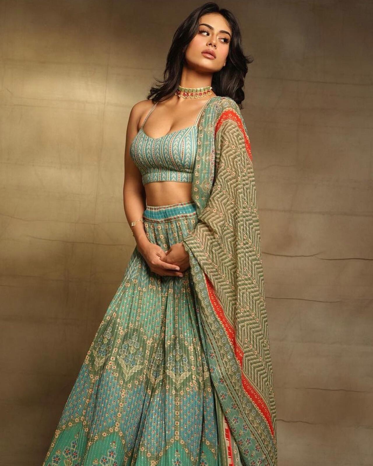 Nysa Devgan looks breathtaking in this sea-foam green and turquoise lehenga, featuring intricate floral prints and delicate shimmer.