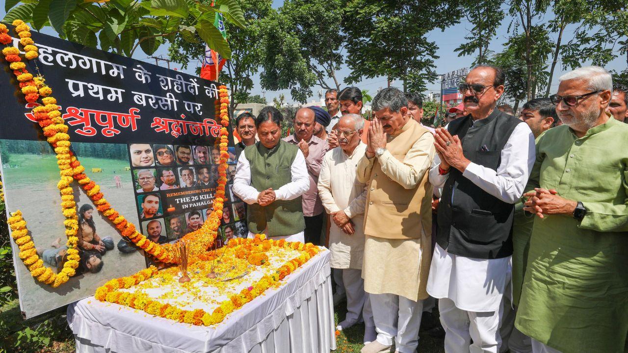 In Jammu, BJP President Sat Sharma and workers pay floral tributes, remembering the victims and expressing solidarity with their families