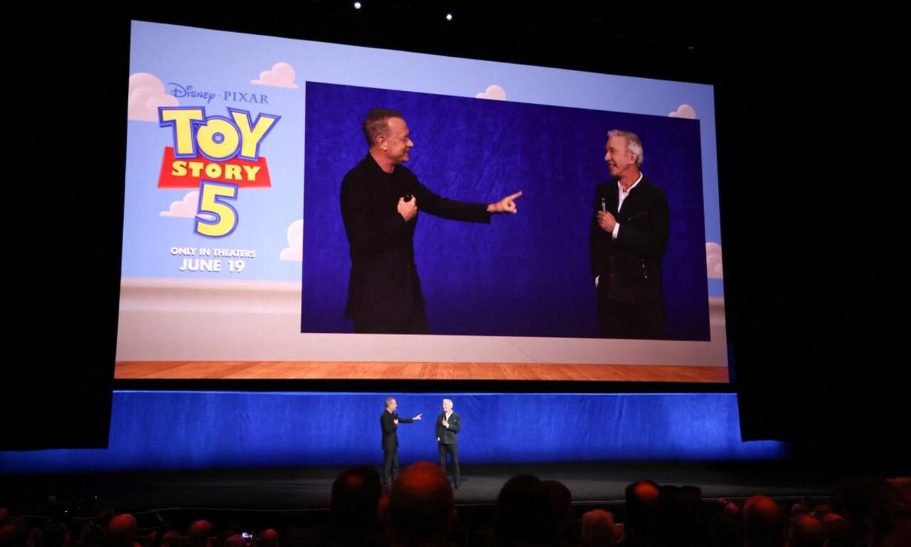 Tom Hanks and Tim Allen arrived together to preview two clips from Toy Story 5, including Woody's reunion with Buzz and the gang at Bonnie's house.