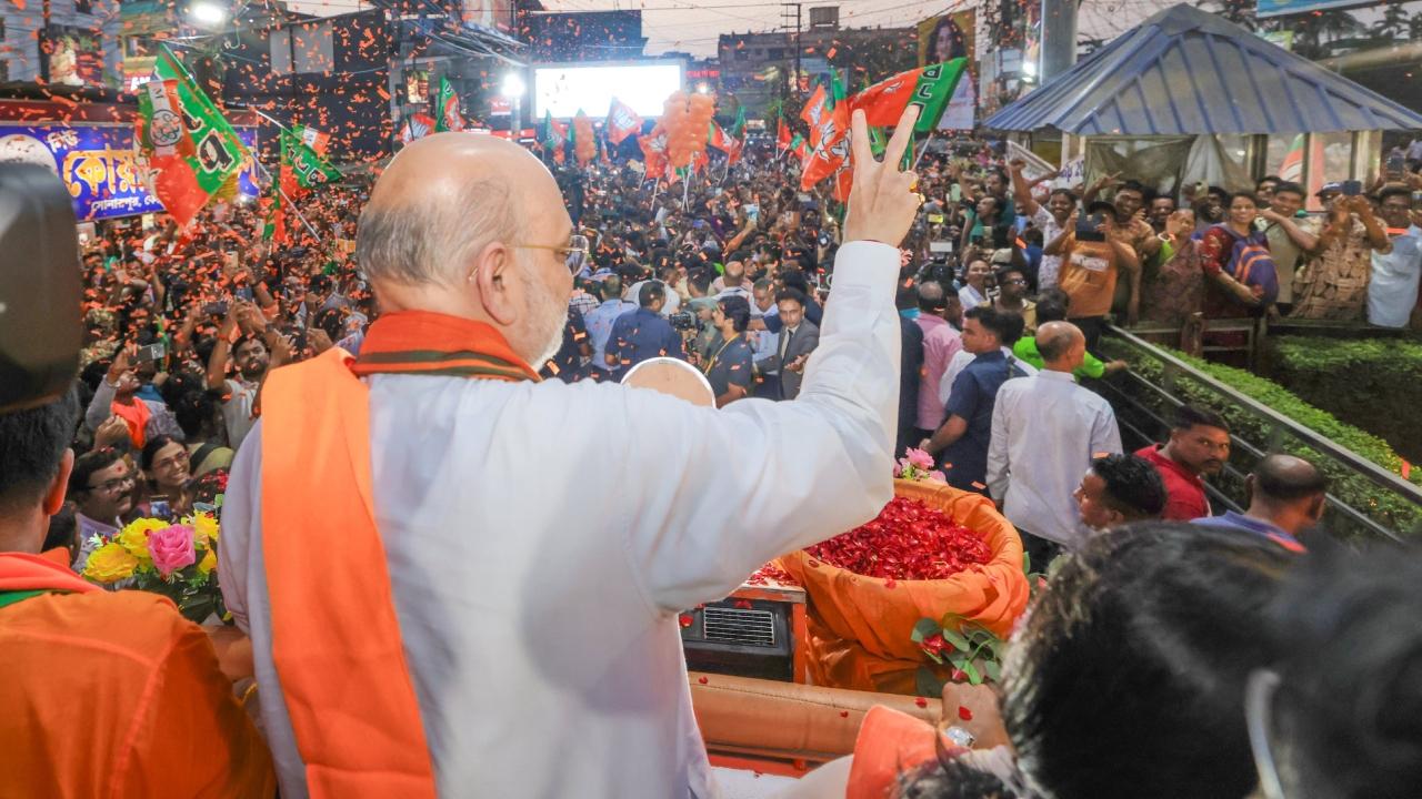 Thousands of jubilant BJP supporters, holding giant party flags and chanting "Bharat Mata Ki Jai" and other slogans, walked in the road show.