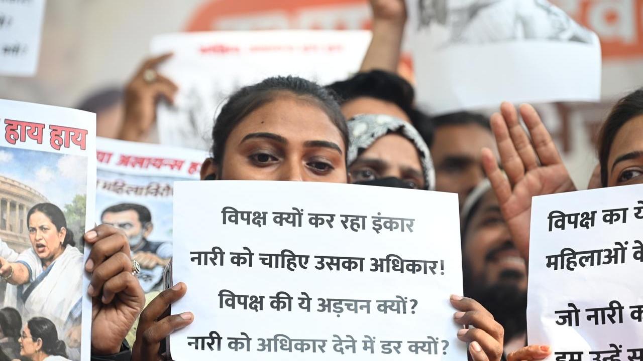 The protesters raised slogans calling for swift action to ensure 33 per cent reservation for women in legislative bodies