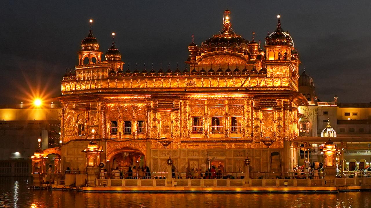 An illuminated view of Golden Temple on the eve of Baisakhi, in Amritsar, on Monday, April 13