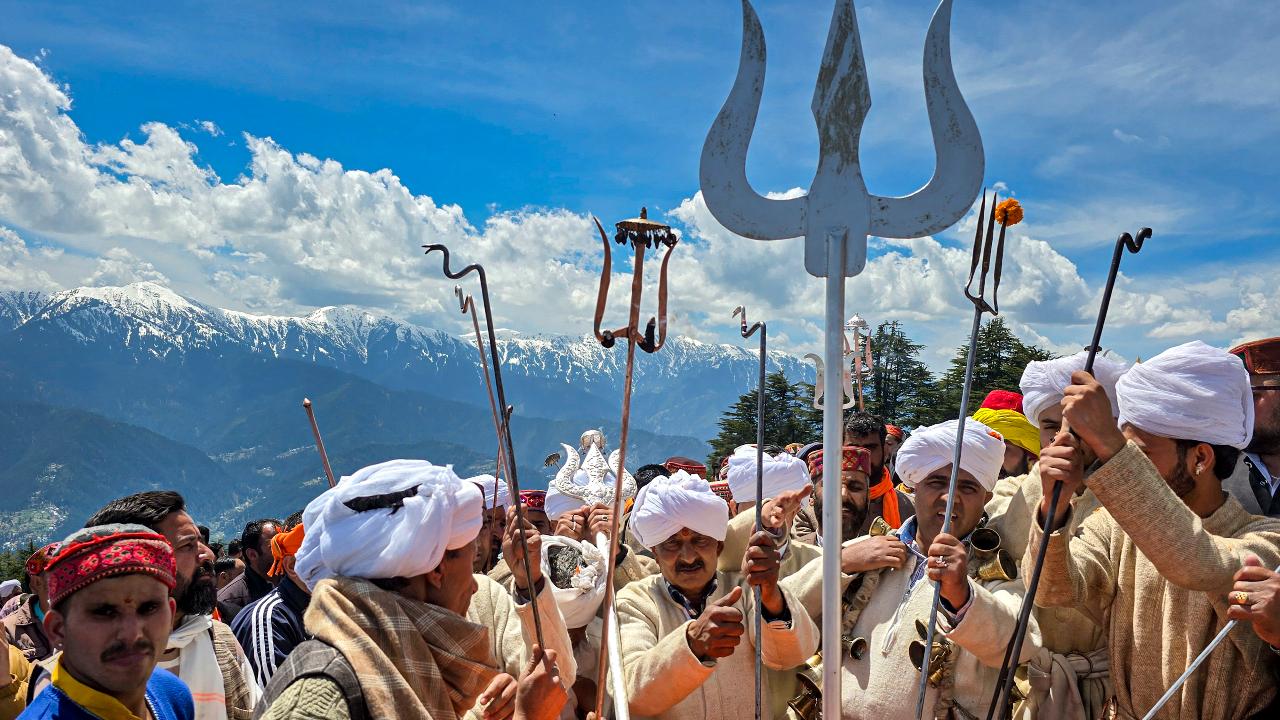 Thousands of Nag followers trekked treacherous terrain to reach the ancient hilltop Subar Nag temple to participate in the age-old rituals of Nag Baisakhi, which symbolises the arrival of the spring season after prolonged harsh winters in the Bhaderwah valley, Jammu and Kashmir