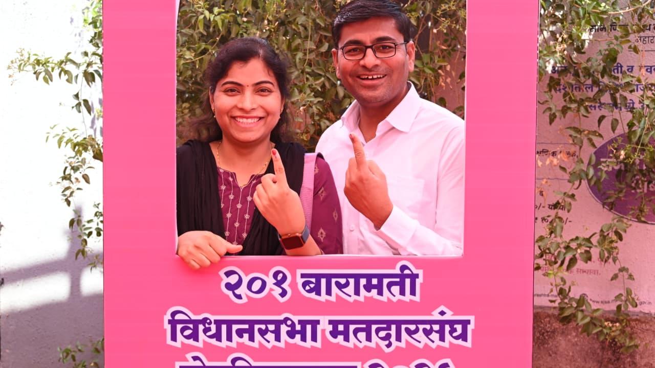 A couple gets a picture clicked at the photo booth after casting their vote. There is no candidate in the fray from the Opposition Maha Vikas Aghadi (MVA) against Sunetra Pawar. The rival NCP (SP) led by Sharad Pawar decided not to field a candidate against her. While ally Congress gave candidature to Akash More, the party later decided to withdraw his name