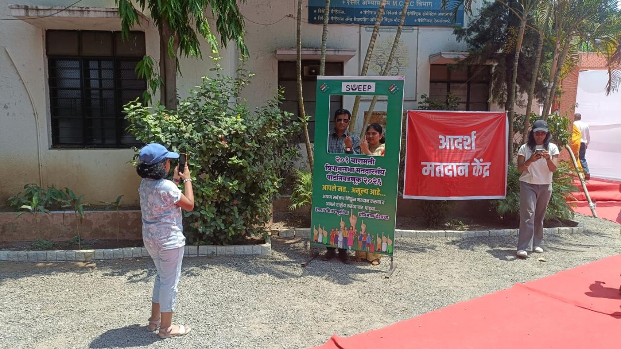 A child clicks the photo of her parents at the photo booth. Election officials in Baramati said elaborate arrangements have been made to facilitate the smooth conduct of the polling. "To ensure that the scorching heat does not dampen the spirit of voters, we have installed mandaps (sheds) outside polling booths, and water coolers have been placed to ensure access to drinking water," an official said.