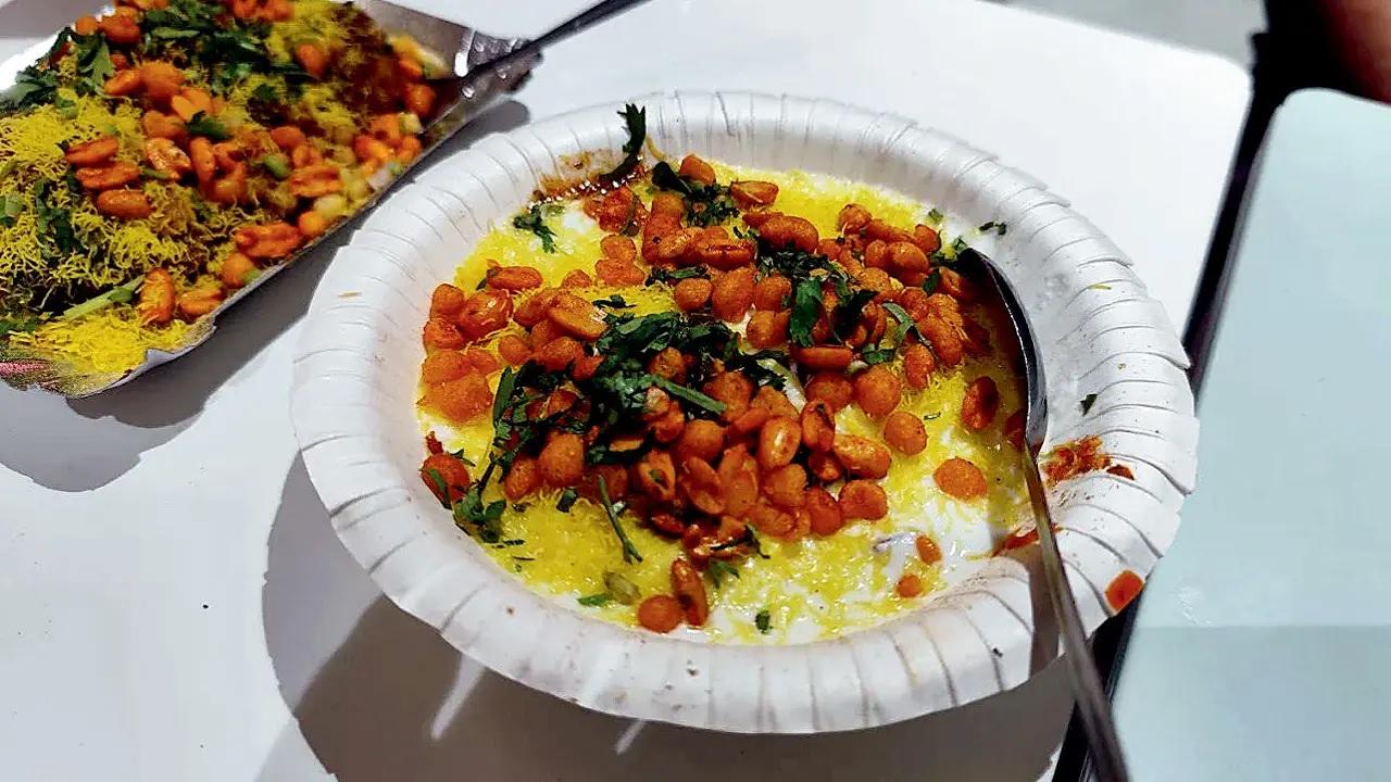 <p><strong>Indori twist</strong><br />Sometimes, all we need is a good papri chaat done right. This Indori version in Dadar leans into that thought. Their Special Indori Chaat (below) has boiled potatoes, papri, chilled yoghurt, imli chutney, green chutney, onions, coriander, and a snowfall of fine sev. It&rsquo;s familiar but slightly sweeter, and loaded with dahi. You could get distracted by the dahi kachori or Indori poha here, but stay focused. This one plate is worth it.</p>
<p><strong>At </strong>Induri Namkeen Chaat, Ranade Road, Dadar West.<br /><strong>Call </strong>7947115637&nbsp;<br /><strong>Cost</strong> Rs 110</p>