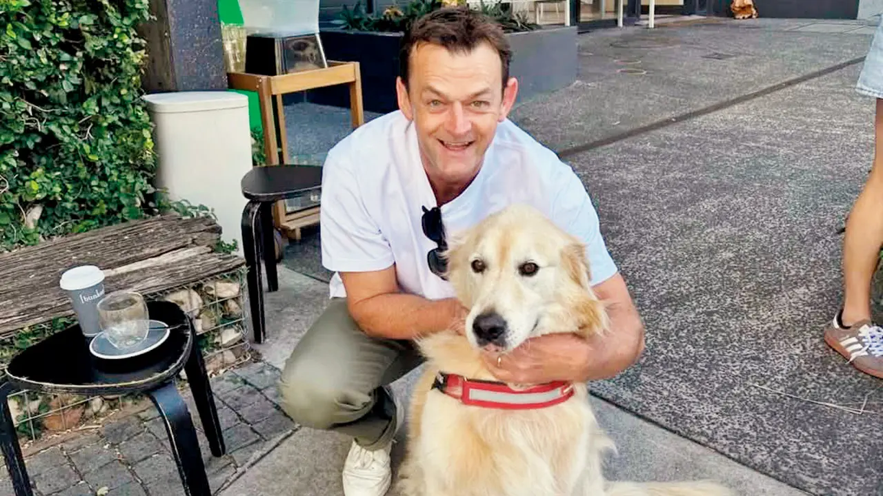 Adam Gilchrist with pet dog Ricky Ponting. pics/Gilchrist’s Instagram