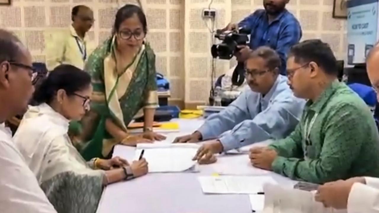 With folded hands and her trademark smile, Banerjee walked nearly 600 metres with women supporters blowing conch shells and raising ululations and party workers waving Trinamool Congress flags.