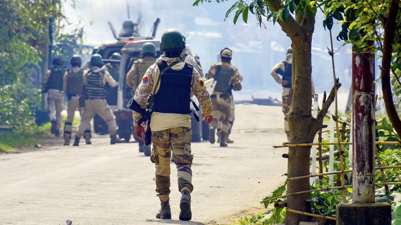 Security personnel fire tear gas shells in Thoubal district. PIC/PTI