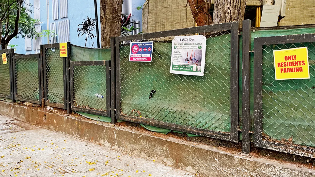 Signboards restricting parking put up on the wall along the road. PICS/MADHULIKA RAM KAVATTUR 