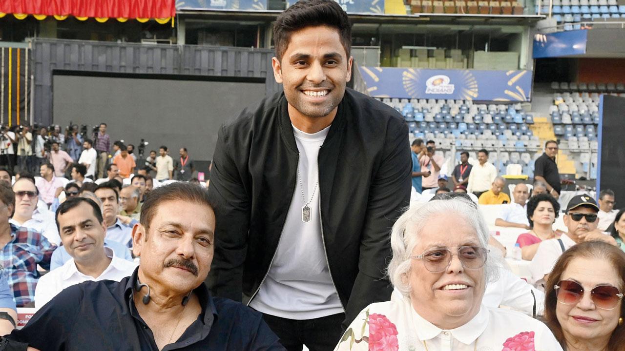Ravi Shastri (left), Suryakumar Yadav, and Diana Edulji at the Wankhede Stadium on Thursday