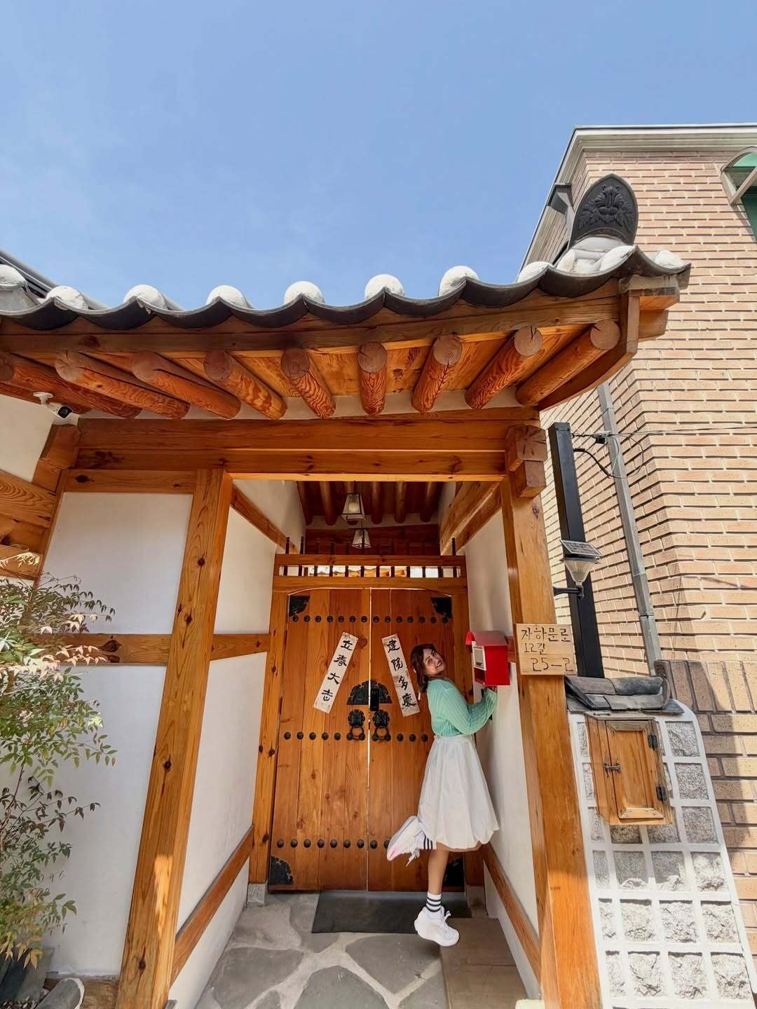 Hina also embraced Korean vibes in a light green top paired with flared white skirt and white sneakers.
