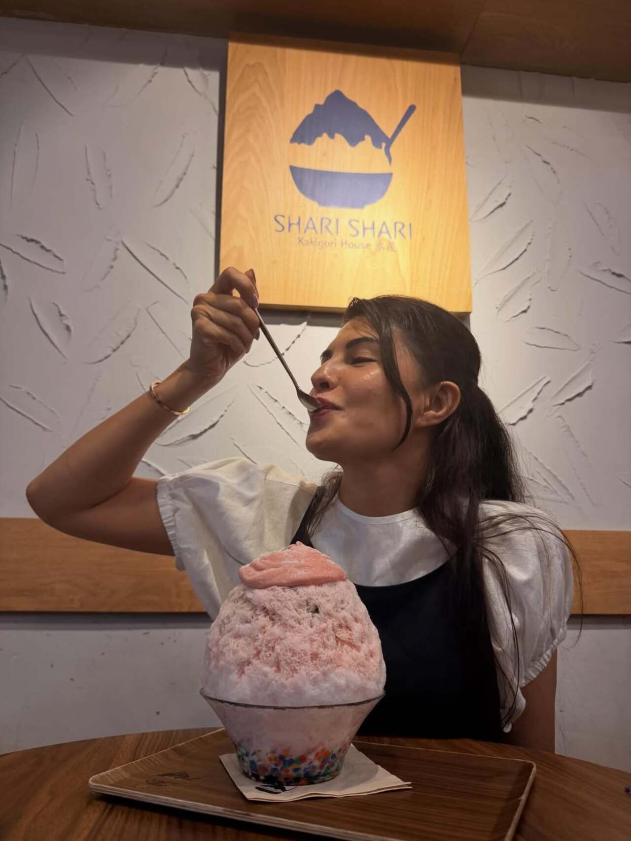 Jacqueline Fernandez enjoys a sweet moment, indulging in ice cream during her fun getaway.