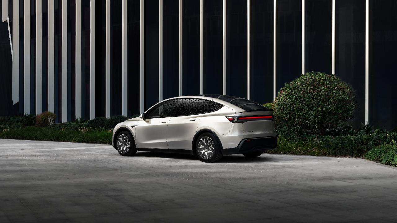 Tesla Model Y LModel Y L, with a range of up to 681 km (WLTP), 0-100 km/h acceleration in just 5.0 seconds and cargo space up to 2,539 L, is designed to be a family vehicle to provide more interior space, versatility and utility for family users.
The Model Y L also maximises headroom, legroom and comfort to give an easy experience to the driver and passengers in the three-row, six-seat design.&nbsp;
The second-row captain seats feature powered armrests, one-touch folding, ventilation, and heating, while the third row gets power recline, one-touch folding and vented climate control.&nbsp;
With an acoustic glass, an updated suspension system, a new 19-inch Machina Wheels, 18 speakers and 1-subwoofer immersive Tesla Audio system providing passengers with a calm and quiet ride