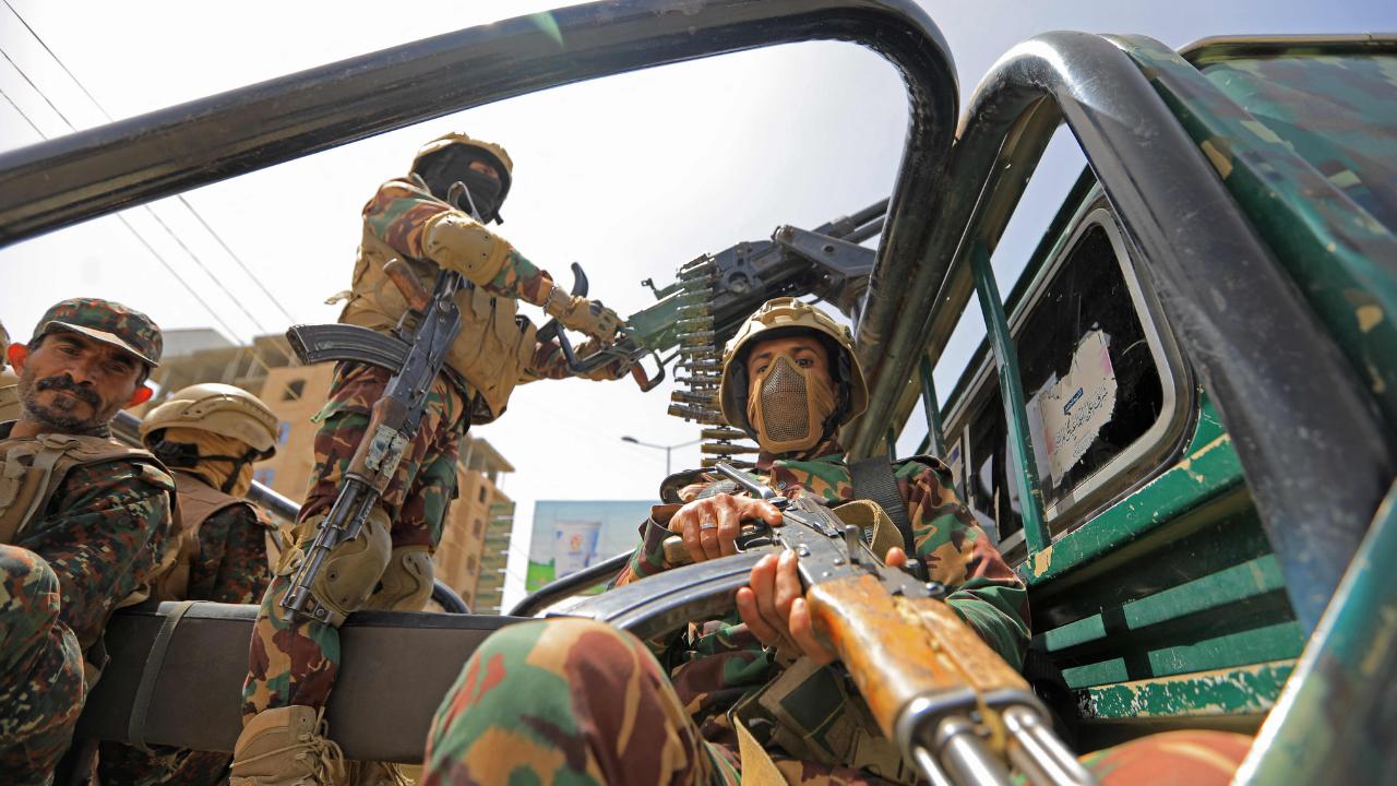 Yemeni security personnel were deployed to maintain order as Houthi supporters gathered in the capital to condemn the Israeli bill