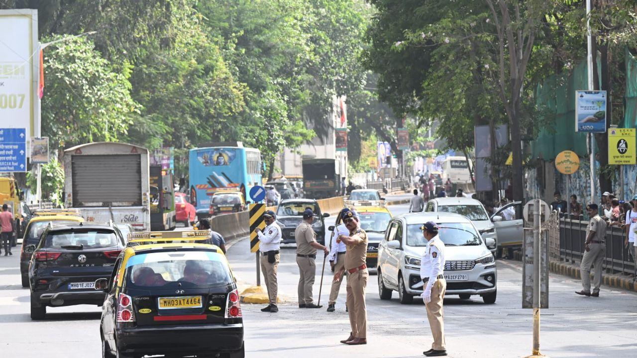 The police band played a sombre tune as the casket was placed inside the vehicle