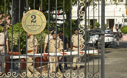 Police personnel inspect the spot following the incident. Pic/PTI