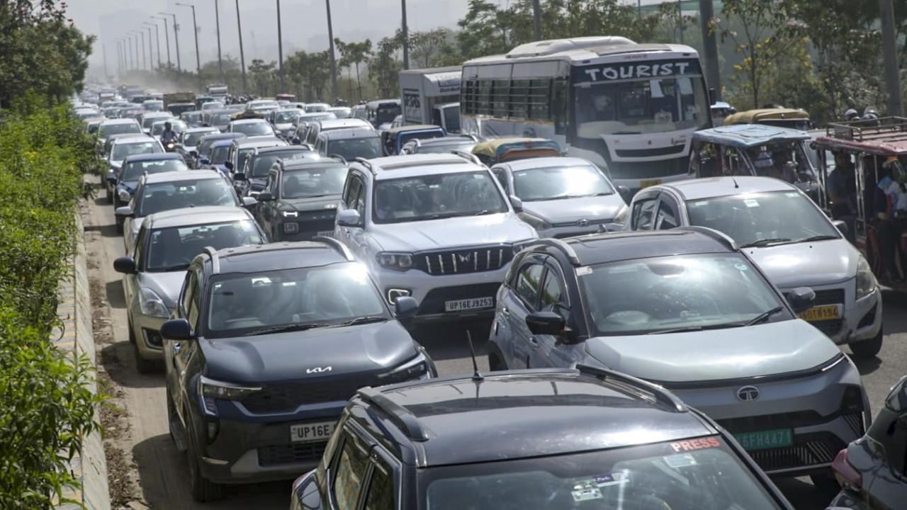 IN PHOTOS: Noida workers launch massive protest, Delhi traffic affected