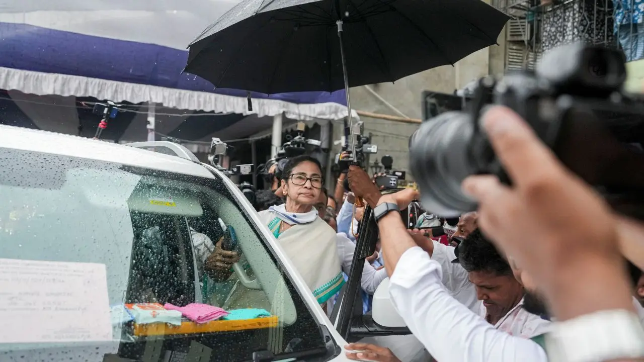 Mamata Banerjee and Suvendu Adhikari visits polling station together. (Pic/PTI)