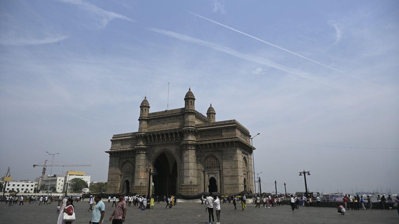 Meanwhile, the iconic Gateway of India appear quieter during peak hours, while many seek shade, hydration, and relief indoors. Pic/ Ashish Raje