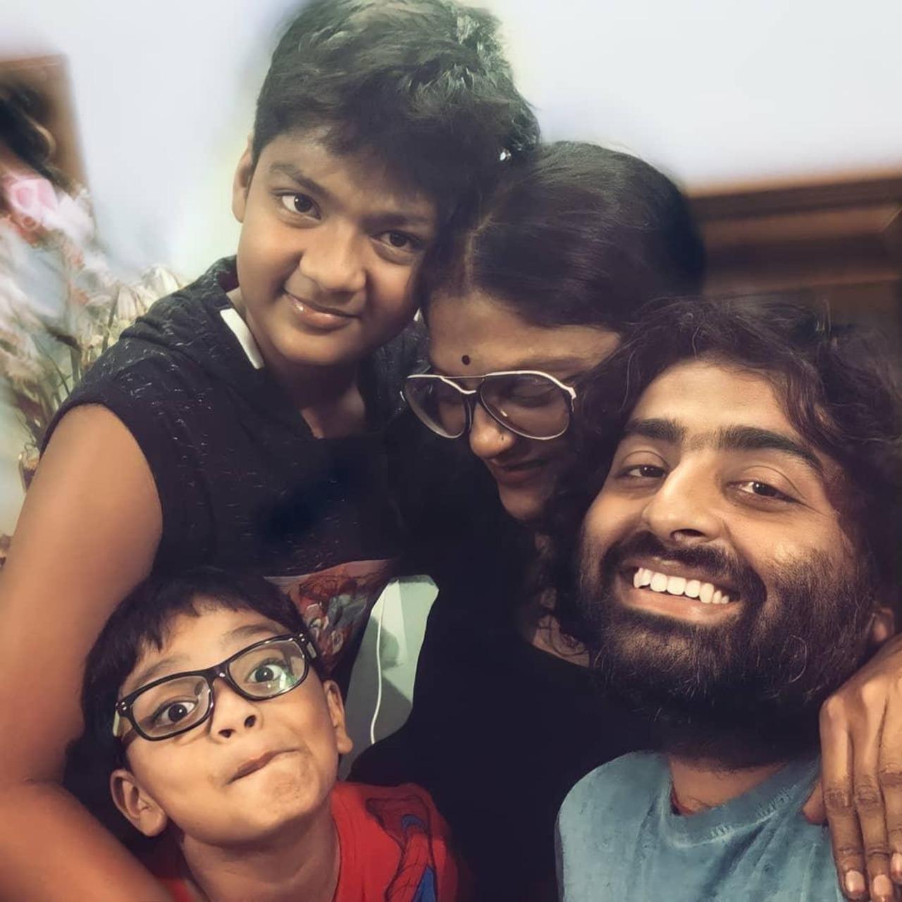 Another cute family picture, where Arijit is seen sharing a playful and intimate moment with his wife and kids.